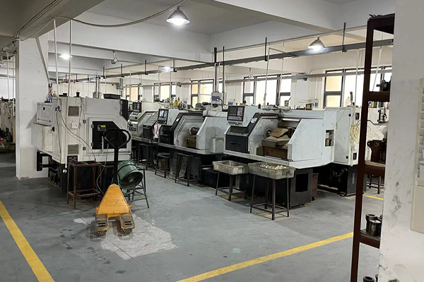 a bustling factory floor with [injection molding](https://www.youtube.com/watch?v=sBEzE4PCmqM)<sup id=