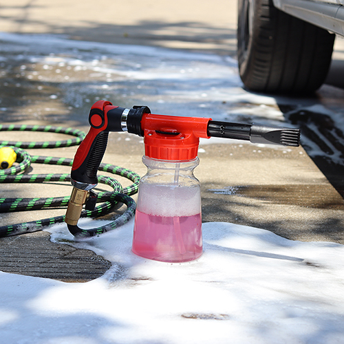 The 2-in-1 foam cannon connected to a garden hose