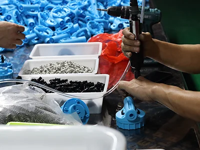 The TZRITAS factory floor with advanced machinery and workers assembling cleaning tools